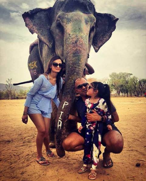 a lovely family with elephant
